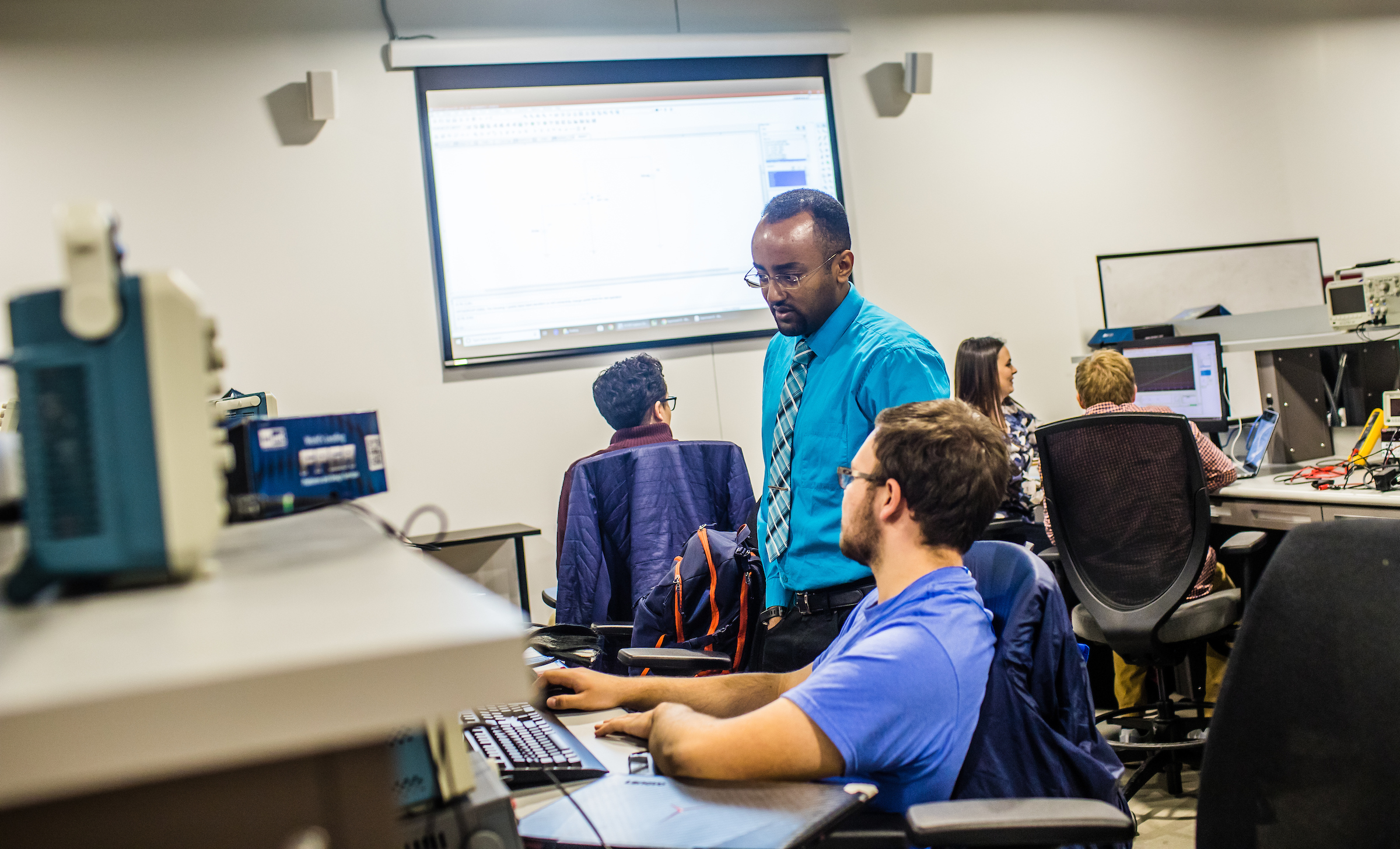Engineering faculty and students in computer lab